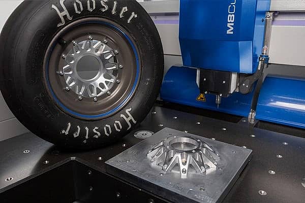 tire rim display showing what you can make with a cnc machine